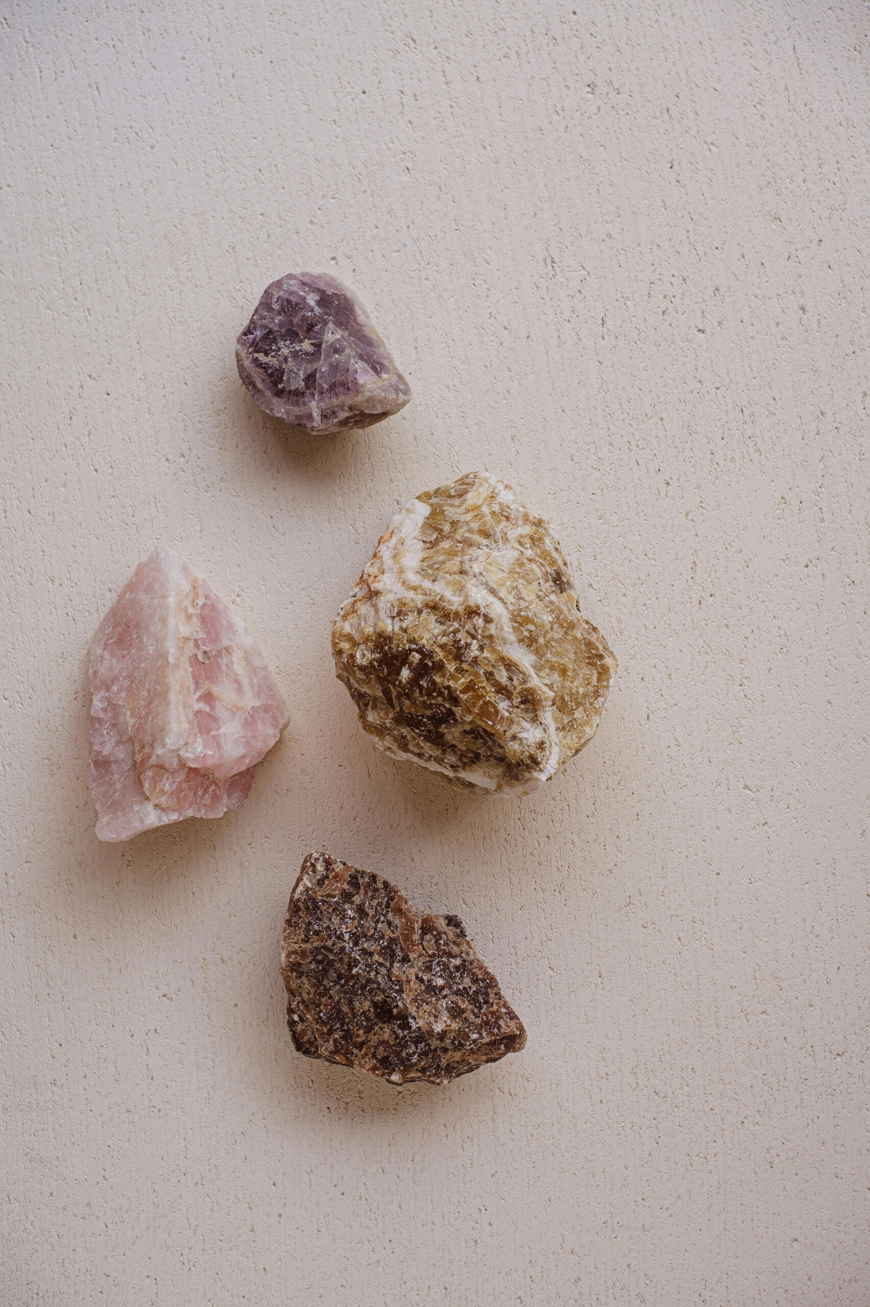 Four raw crystals